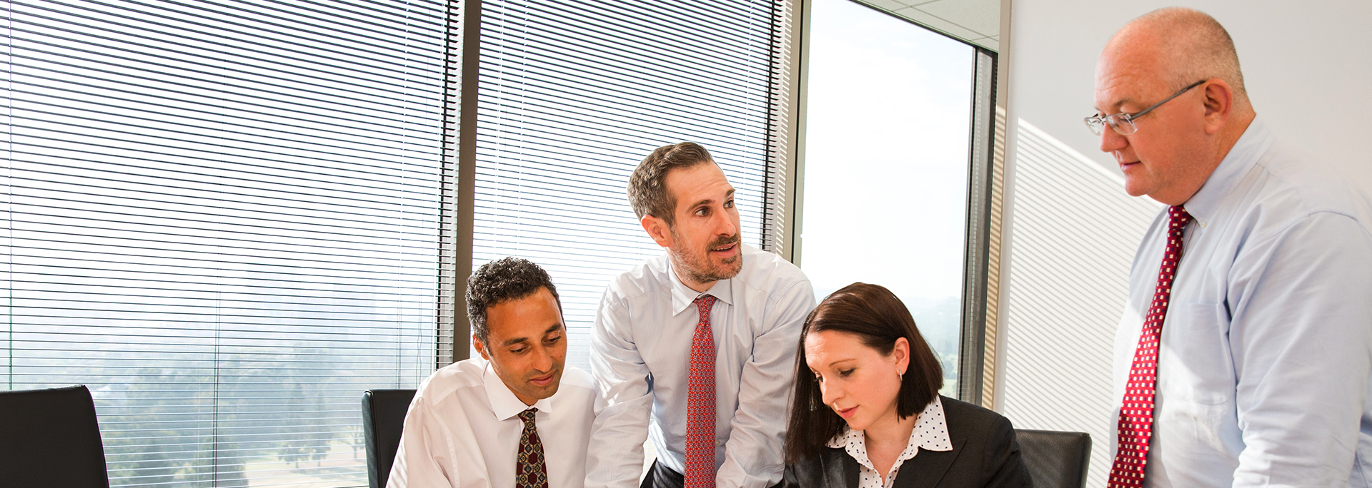 IP Technology Attorneys In Meeting Room