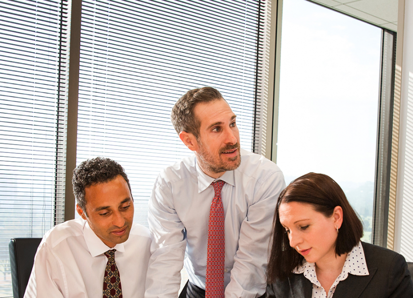 IP Technology Attorneys In Meeting Room